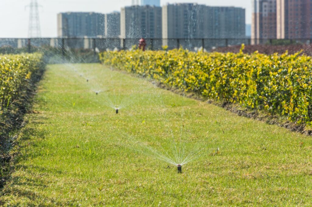 Lawn sprinkler system watering grass